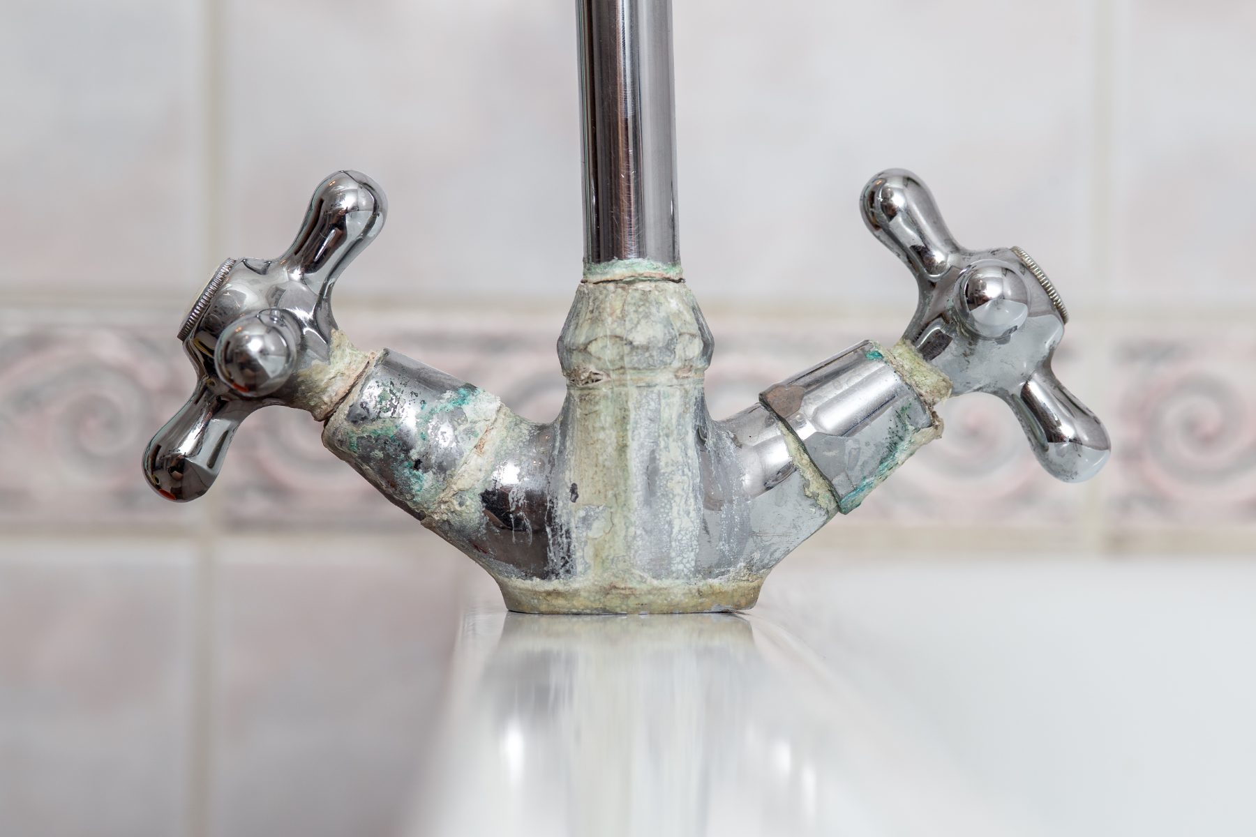 remove limescale from kitchen sink